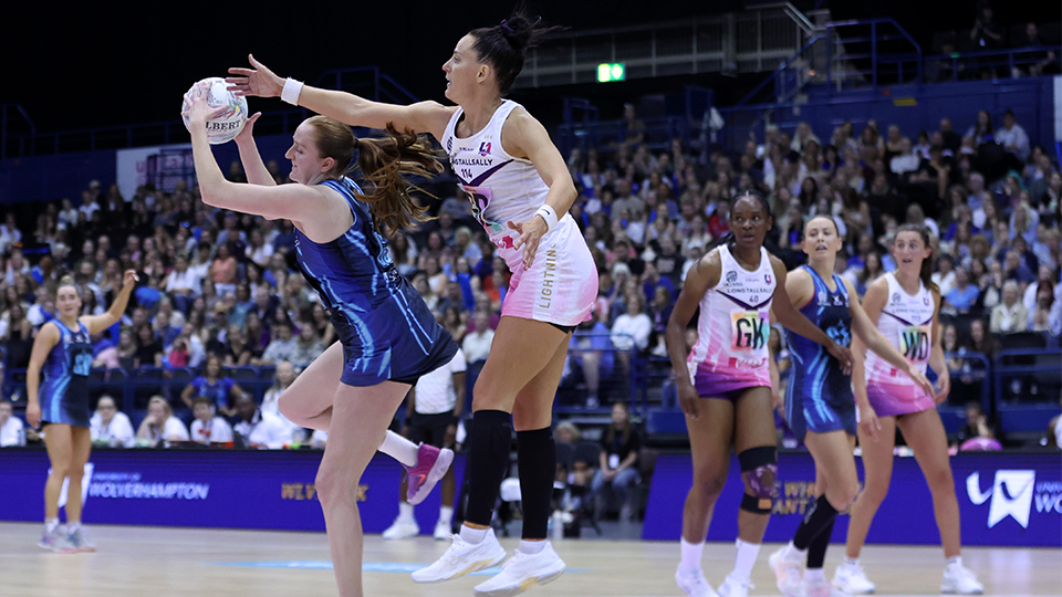 Antonia Mitchell catching the ball whilst being contested by Shadine Van Der Merwe