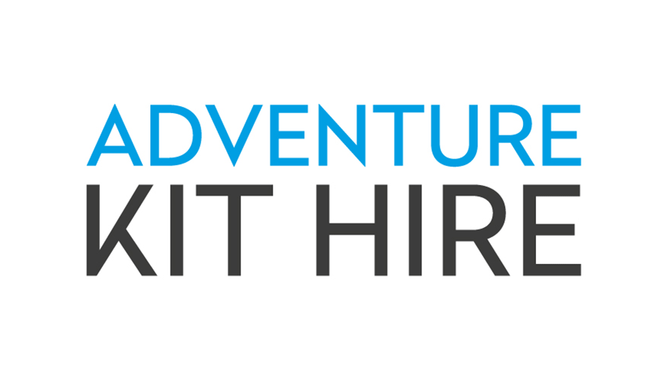 The Adventure Kit Hire logo. There isa plain white background. The word adventure is in a light blue and the words kit hire are in black.