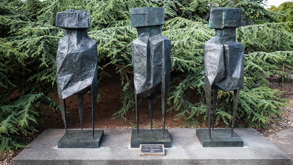 The Watchers sculptures on campus