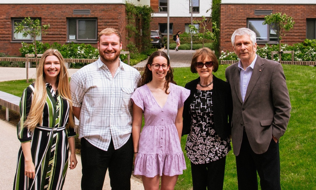 Barry and Valerie Eccleston with the Flux team on site at Claudia Parsons hall