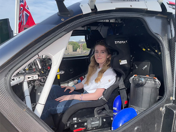Grace in a vehicle.