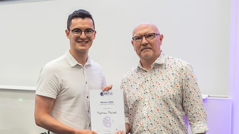 Matthew Putland receiving the winner's certificate